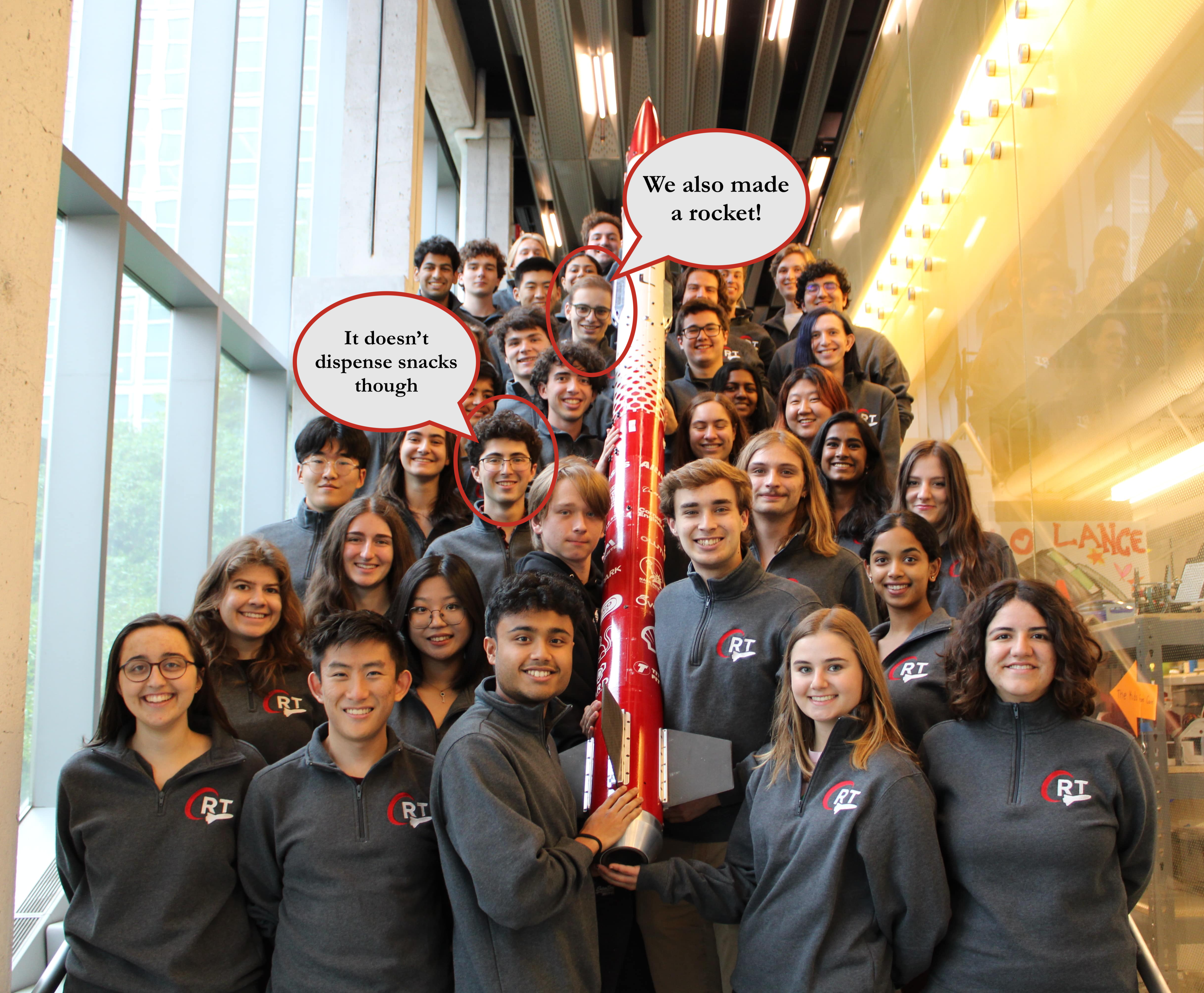 Picture of Aidan and Will with the Cornell Rocketry Team